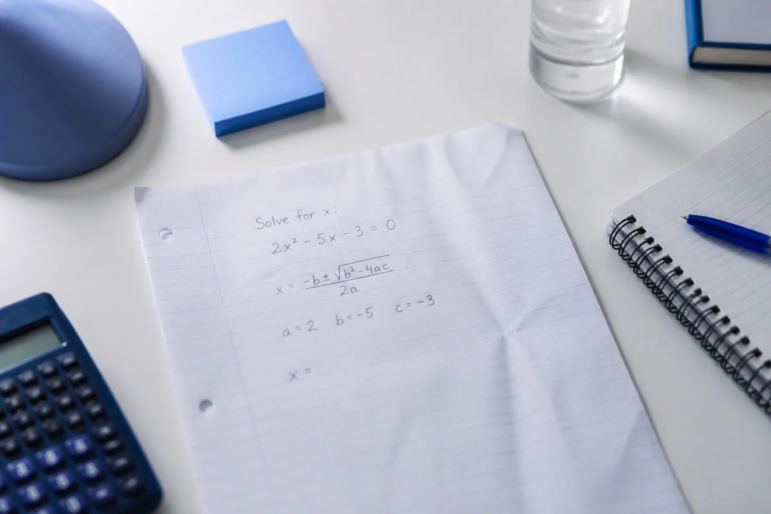 Handwritten math homework problem before scanning with Eqora